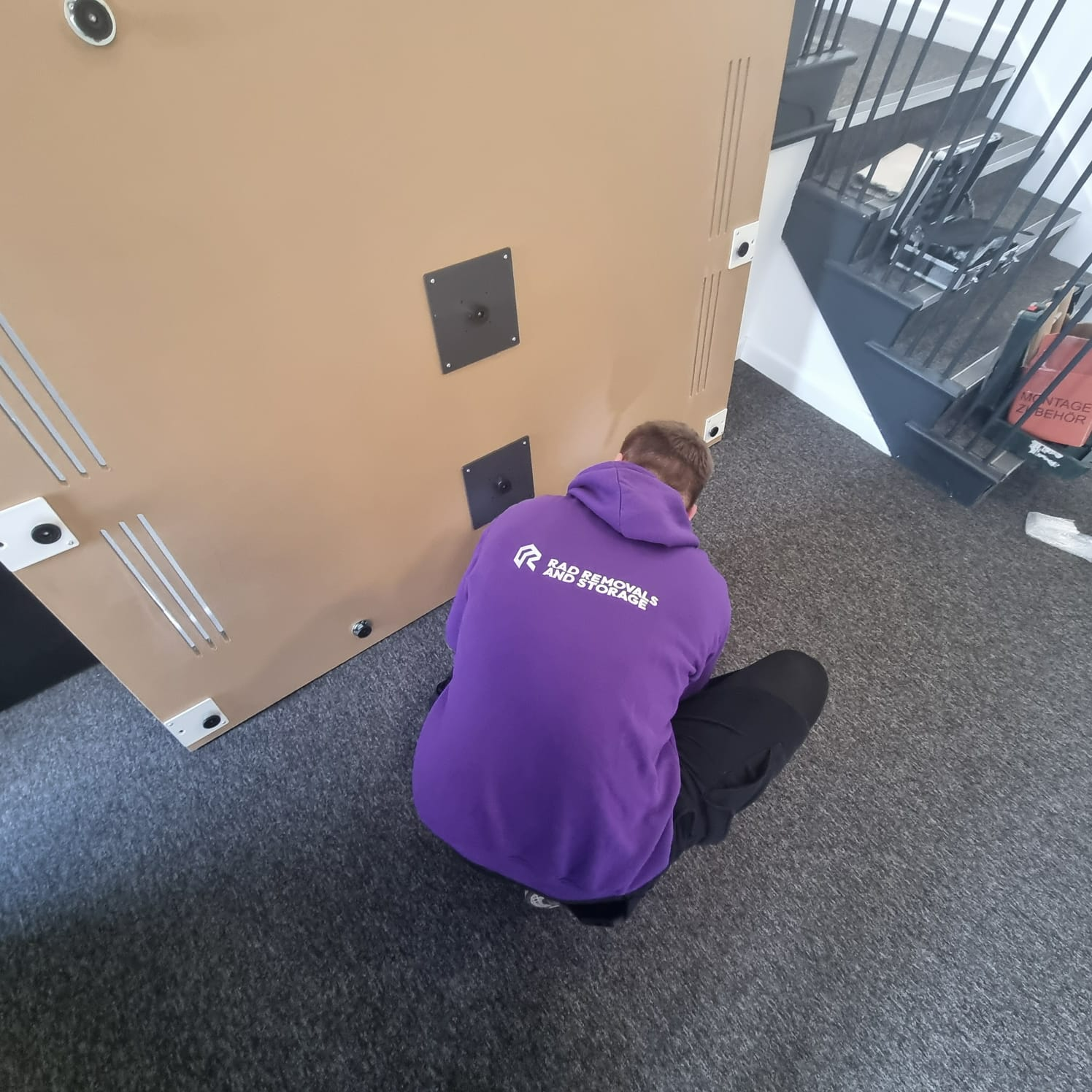 Rad Boy Dissasembling Office Furniture And Equipment