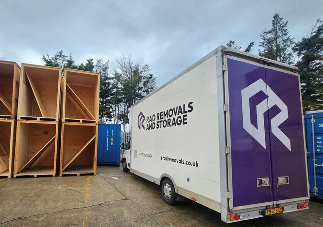 Rad Removals Van At THe Storage With RadPods in the background