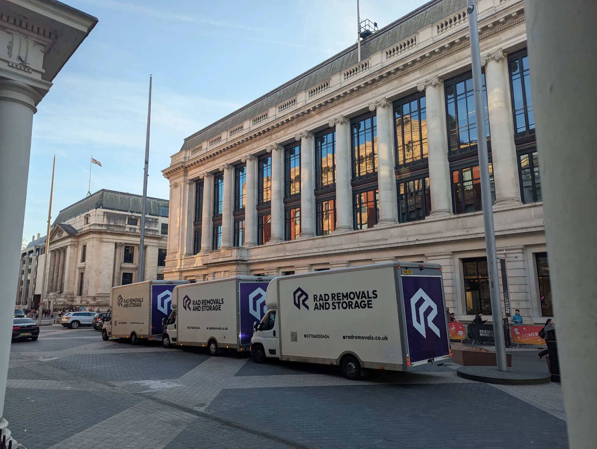 Rad fleet parked in front of the Science Museum in South Kensington, showcasing business storage unit solutions for office furniture.