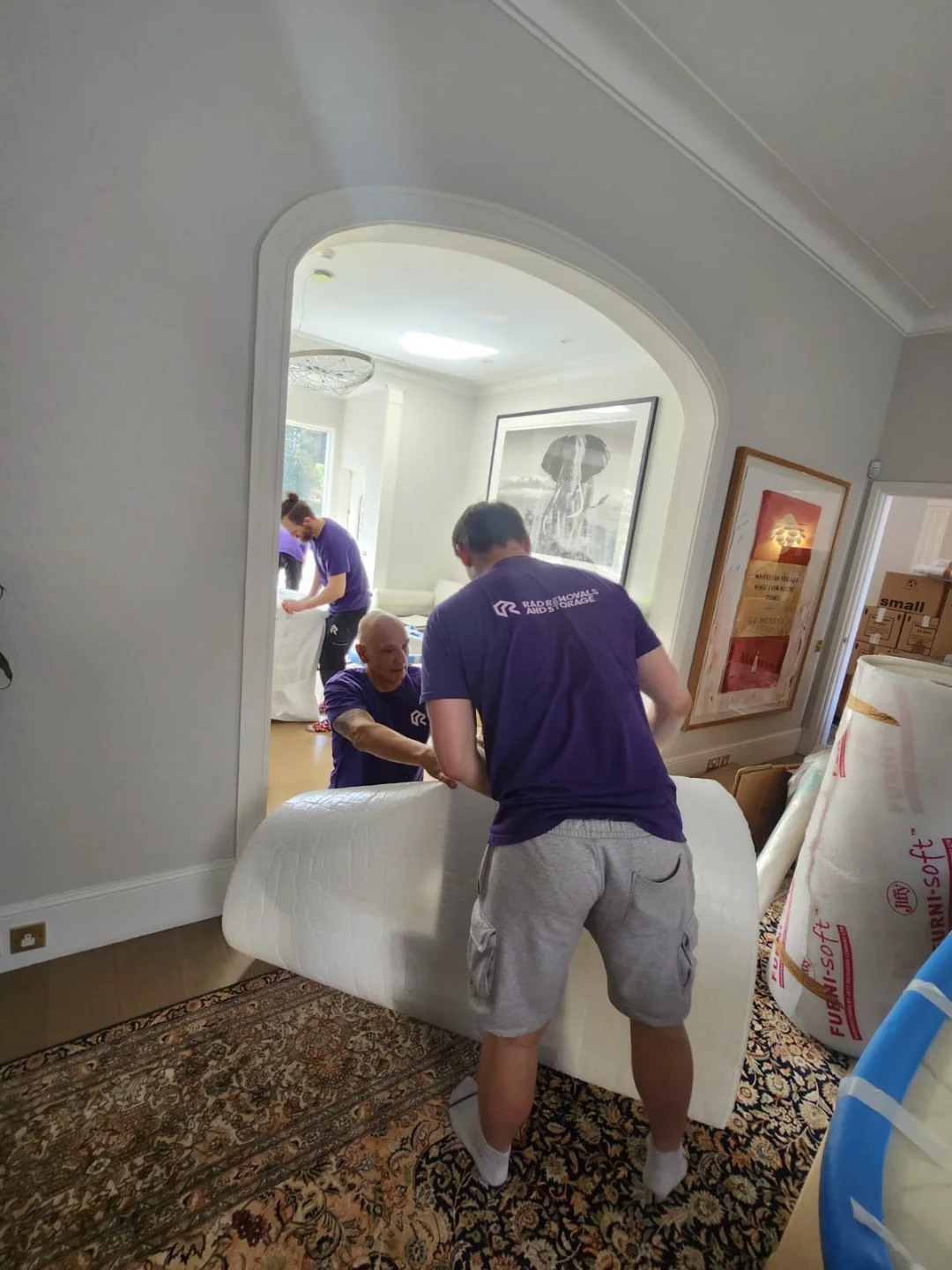 Rad’s team performing fragile packing and fine art packaging in West London, carefully securing delicate art and antiques.