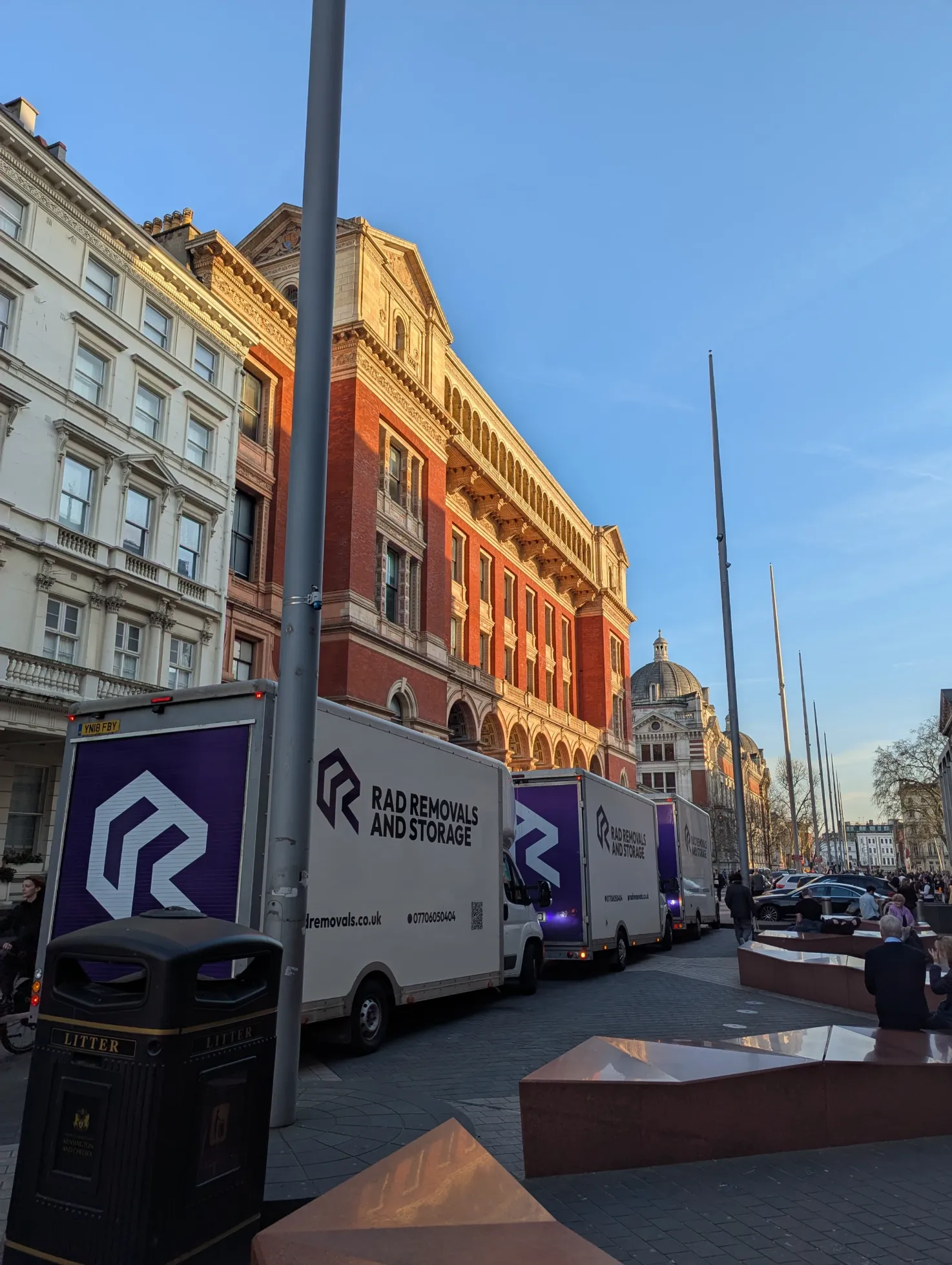 Rad vans parked opposite the Science Museum in South Kensington, showcasing renovation storage container and storage for home renovation services.